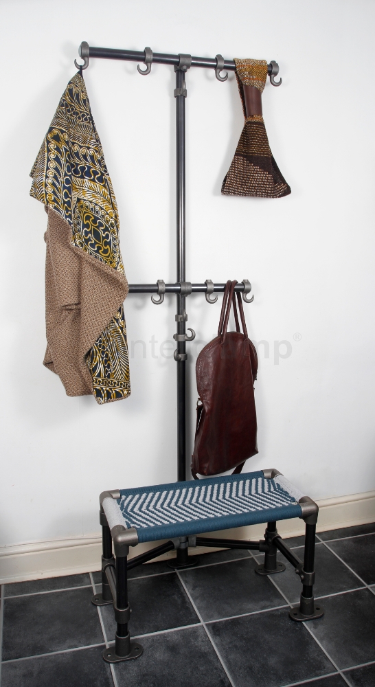 Interclamp key clamp fittings and tube used to build a multi-purpose home coat stand that also serves as a seat, providing a space-saving solution.